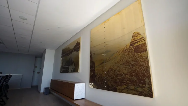 there is a picture of a wall with a picture of a man on it