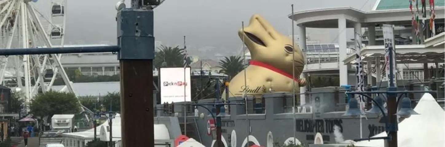 there is a giant bunny statue in the middle of a city
