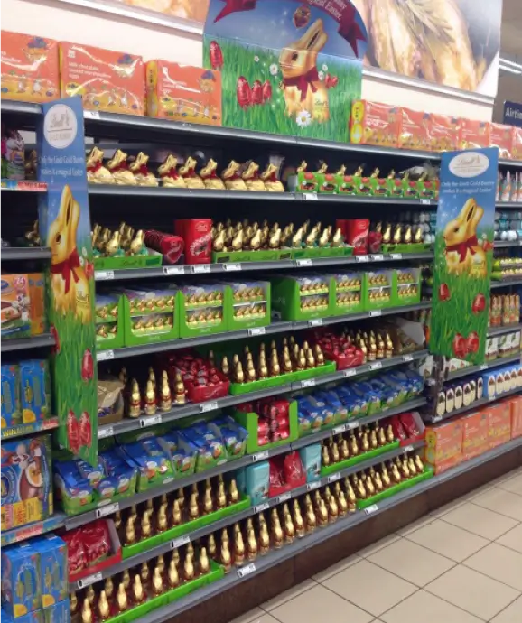 arafed display of chocolate eggs and candy in a store