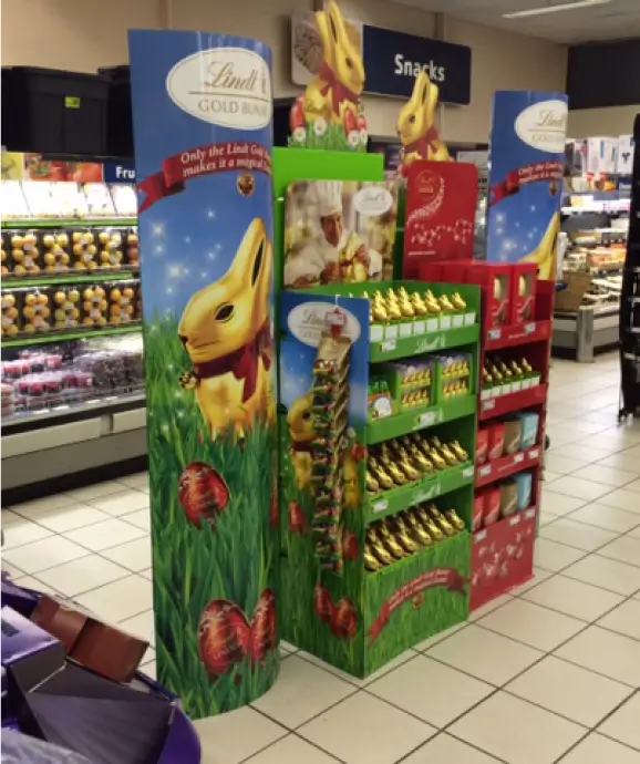 a close up of a display of chocolate eggs in a store