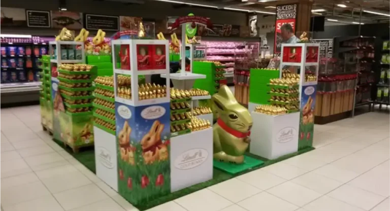 araffe display of chocolate eggs and candy in a store