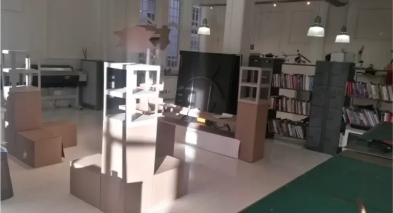 there is a room with a lot of boxes and a television