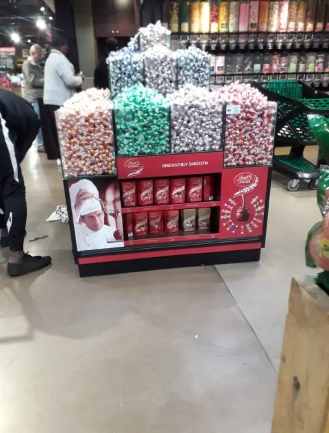 there are many different types of candy in the store