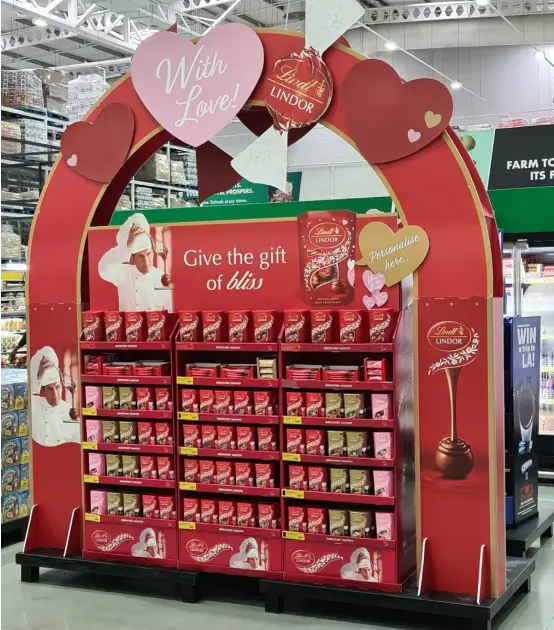 a close up of a display of chocolates in a store