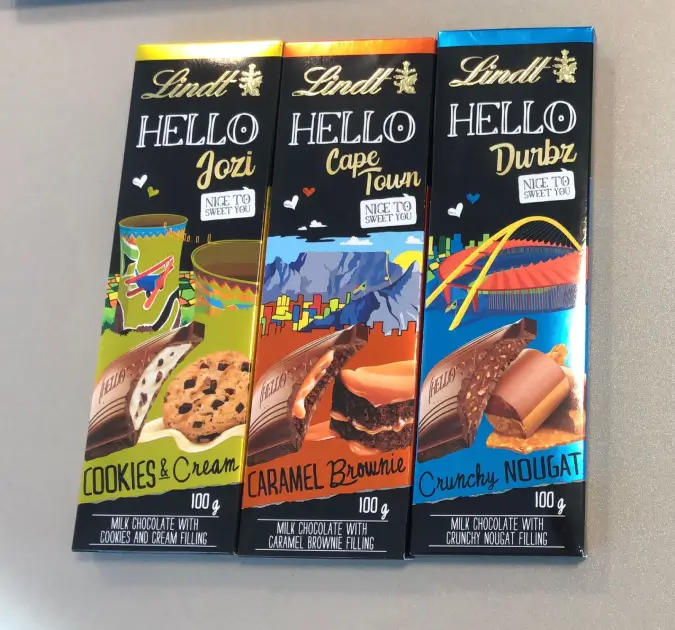 three boxes of cookies are sitting on a table