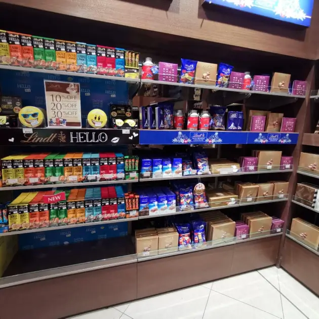 a close up of a store shelf with various items on it