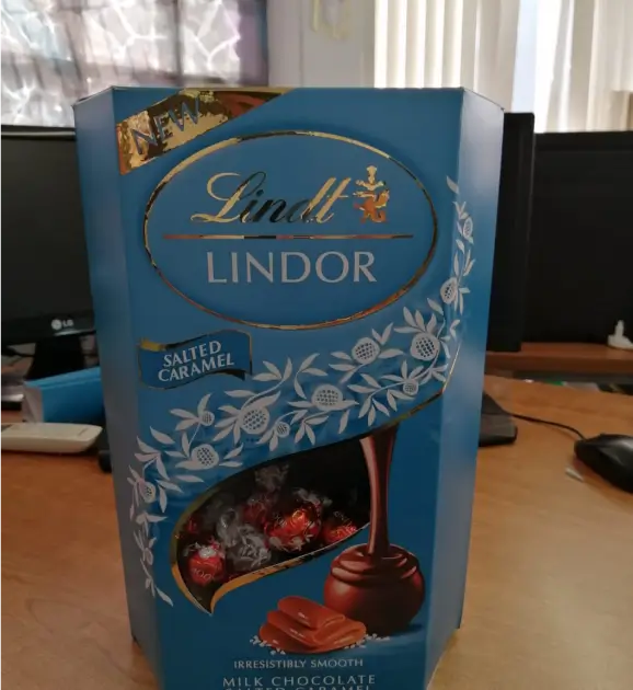 a close up of a box of lindtor chocolates on a table