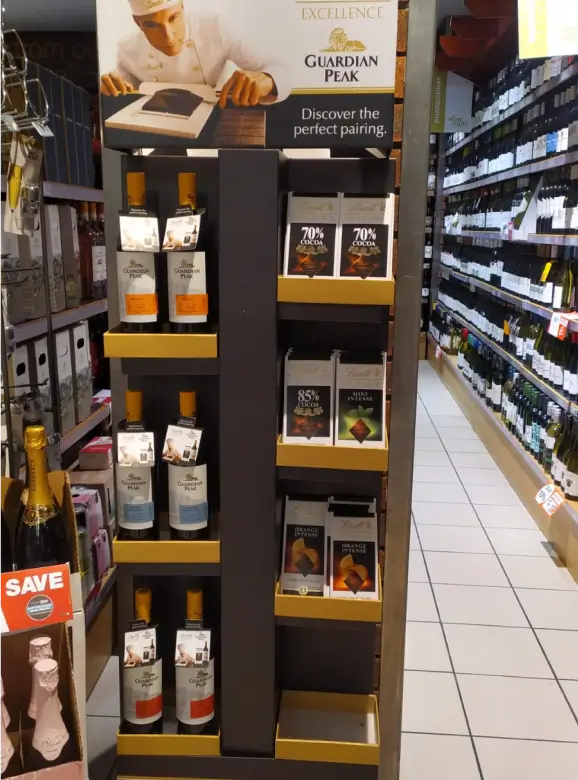 a close up of a display of wine and other beverages